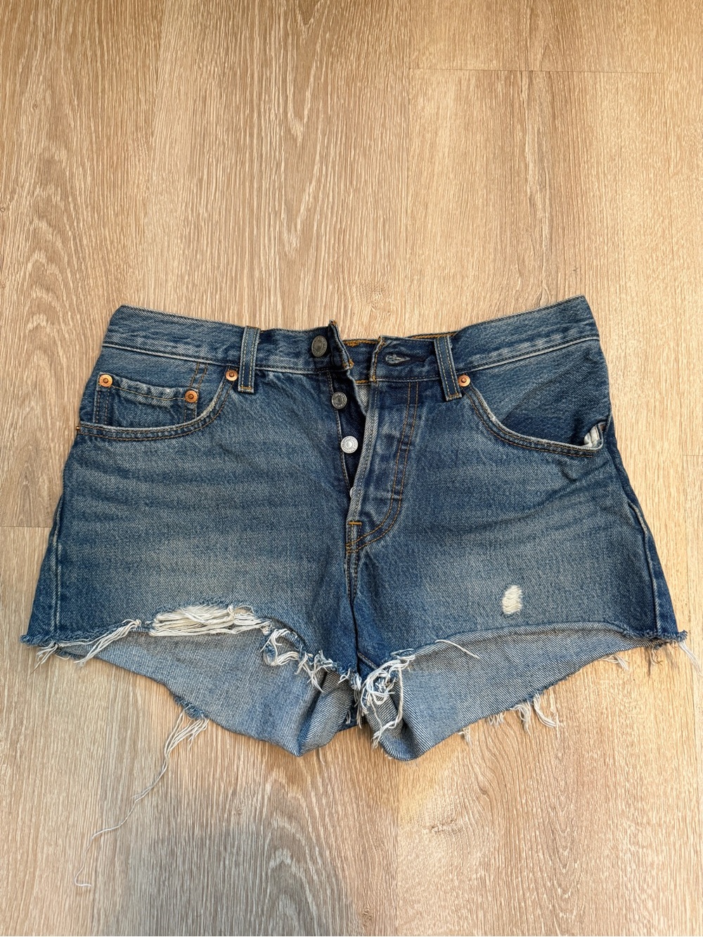 Levi's Distressed Medium Blue Denim Cutoff Shorts